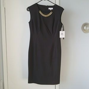 Black dress with gold chain from Calvin Klein